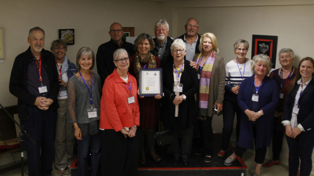<p>A CARING COUNTY Anne Preston, County Kids Read organizer (centre) along with volunteers and community partners, accepted a certificate on behalf of the mayor and council while celebrating their 10th anniversary of distributing free books to children.  (Desirée Decoste/Gazette Staff)</p>

