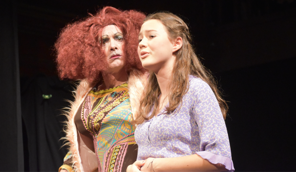 <p>CUE THE HIJINKS- (Left) Dame Foxtrot, played by Pat Larkin looks on in concern toward daughter Mary (right), played by Sage Noxon in the Mummer’s latest pantomime, Hickory Dickory Dock.  The performance opened last night at Mount Tabor Playhouse and runs until Sunday. (Sarah Williams/Gazette staff)</p>
