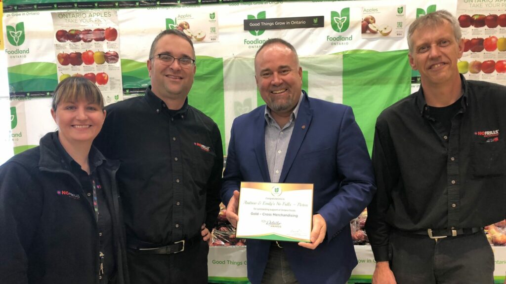 <p>GOLD  STANDARD- Bay of Quinte MPP Todd Smith presents (Left) No Frill’s owners Emily and Andrew Januszkiewicz and (Right) produce manager Dave Wright with the Foodland Ontario gold award for cross merchandising. (Jason Parks/Gazette Staff)</p>
