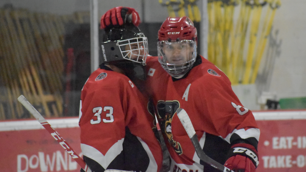<p>SENSATIONAL EFFORT- Picton’s Griffen Conger congratulates netminder Eric Tessier on his first PJHL shutout on Thursday, Nov. 7, 2019. Picton blanked the visiting Gananoque Islanders  5-0 at Huff Estates Arena. (Jason Parks/Gazette Staff)</p>
