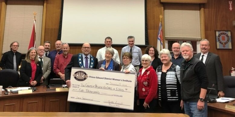 <p>ALL ABOARD – Members of the Prince Edward District Women’s Institute present a cheque for $5,000 to Council during the December 17th Regular Council Meeting. (Submitted Photo)</p>
