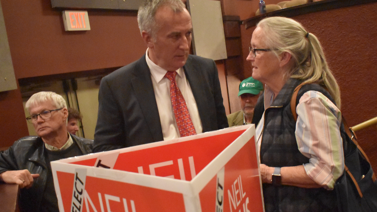 <p>FAMILIAR TERRITORY- (Left) Former Agriculture Minister and local MP Lyle Vanclief watches results as incumbent Bay of Quinte MP Neil Ellis speaks with a supporter on election night in October. On Thursday, Ellis was appointed as parliamentary secretary of Agriculture and Agri-Food Canada, a position formerly held by Vanclief. (Jason Parks/Gazette Staff)</p>
