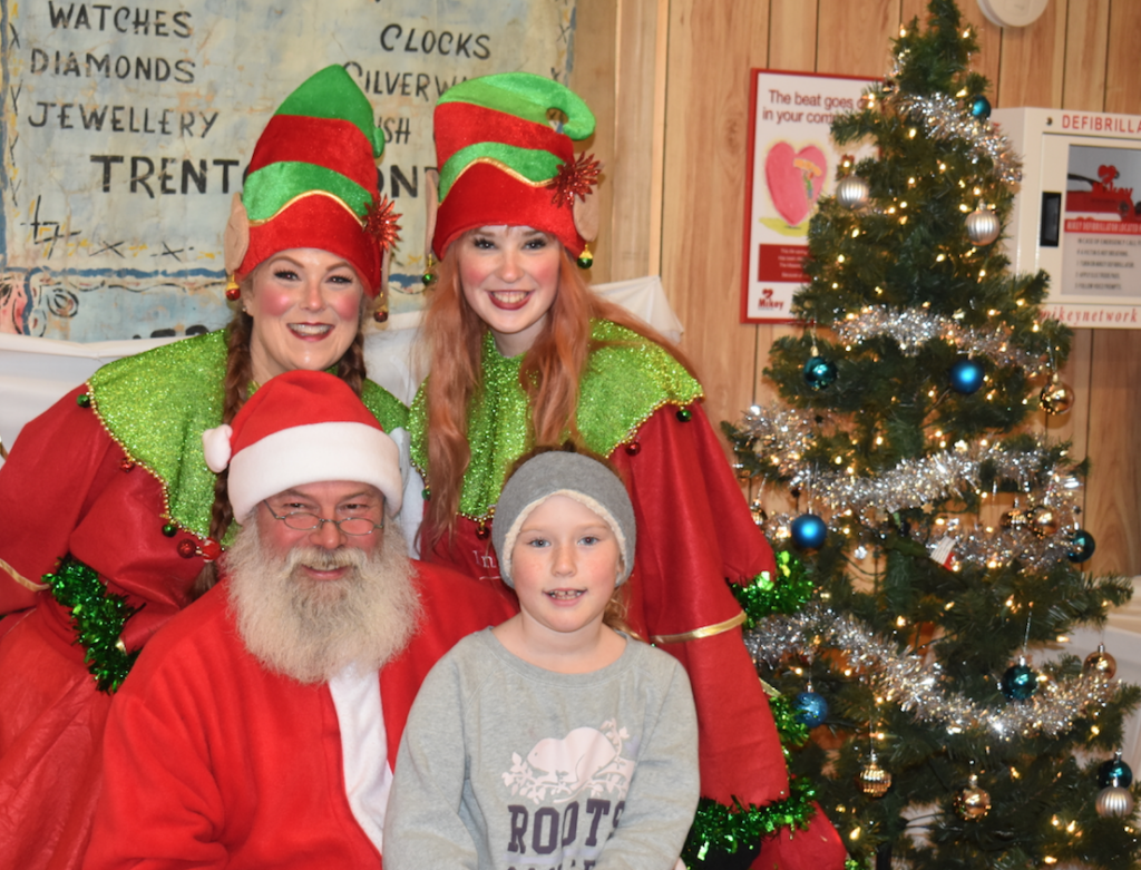 <p>SANTA HAS BEEN FOUND – Santa and some helpers listen attentively to Avery McCormack and other children who came to visit Santa in Consecon Sunday. (Sarah Williams/Gazette Staff)</p>
