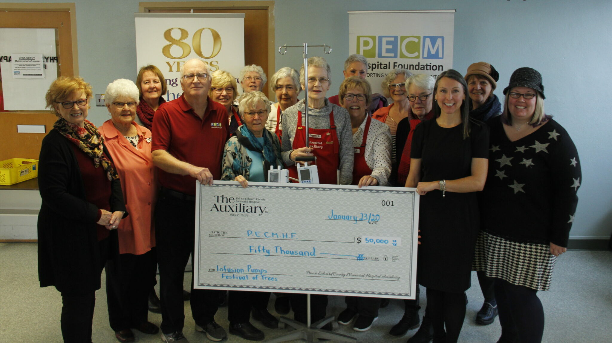 <p>POSING WITH PUMPS- Members of the PECMH Foundation and PECMH Auxiliary posed for a photo in front of two of the new 15 IV Infusion Pumps now in use at PECMH. The PECMH Auxiliary donated $50,000 from the proceeds raised at the 2019 Festival of Trees to the hospital equipment fund. (Desirée Decoste/Gazette Staff)</p>
