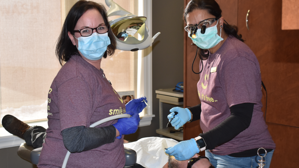 <p>RESTING COMFORTABLY- (L-R) Heather Wylie, assistant, and Dr. Reenu Sandhu perform dental work during last Friday’s free dental clinic at Picton Dental. (Sarah Williams/Gazette Staff)</p>
