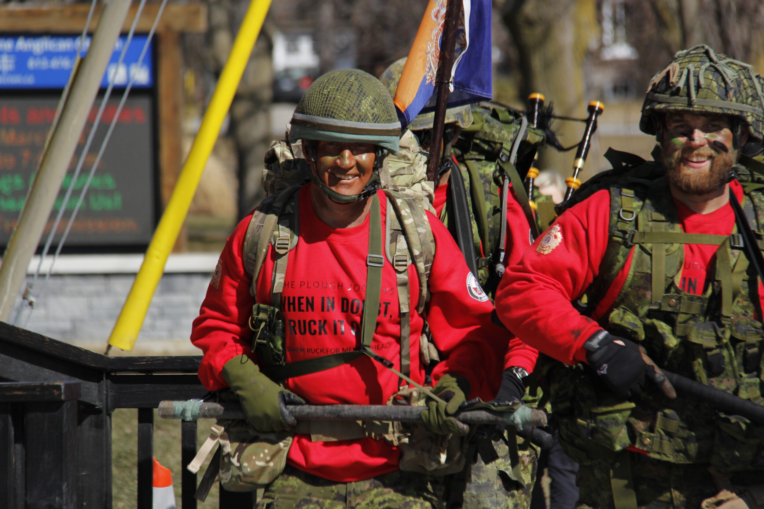 <p>THE PLOUGHJOCKEYS COME HOME- (From Left) Chief Warrant Officer Dean Stokes and Corporal Chad Wilson lead a ruck along Main St. on Thursday. Members of the Hastings & Prince Edward Regiment walked from Cobourg to the ancestral home of the Hasty P’s in honour of the regiment’s centennial celebrations. (Desirée Decoste/Gazette Staff)</p>
