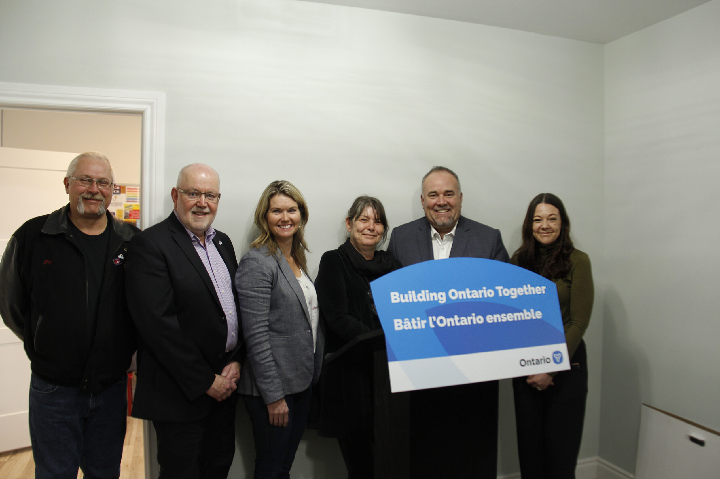 <p>MAKING A DREAM A REALITY (From Left) Prince Edward County Councillors Phil St. Jean and John Hirsch, Associate Minister of Children and Women’s Issues Jill Dunlop, Alternatives for Women (AWF) chairperson Caroline Granger, Bay of Quinte MPP Todd Smith and AFW Executive Director Leah Morgan at AFW Vi’s House in Picton on Friday to announce funding of $277,000 from the provincial government to help complete the women’s shelter project. (Desirée Decoste/Gazette Staff)</p>
