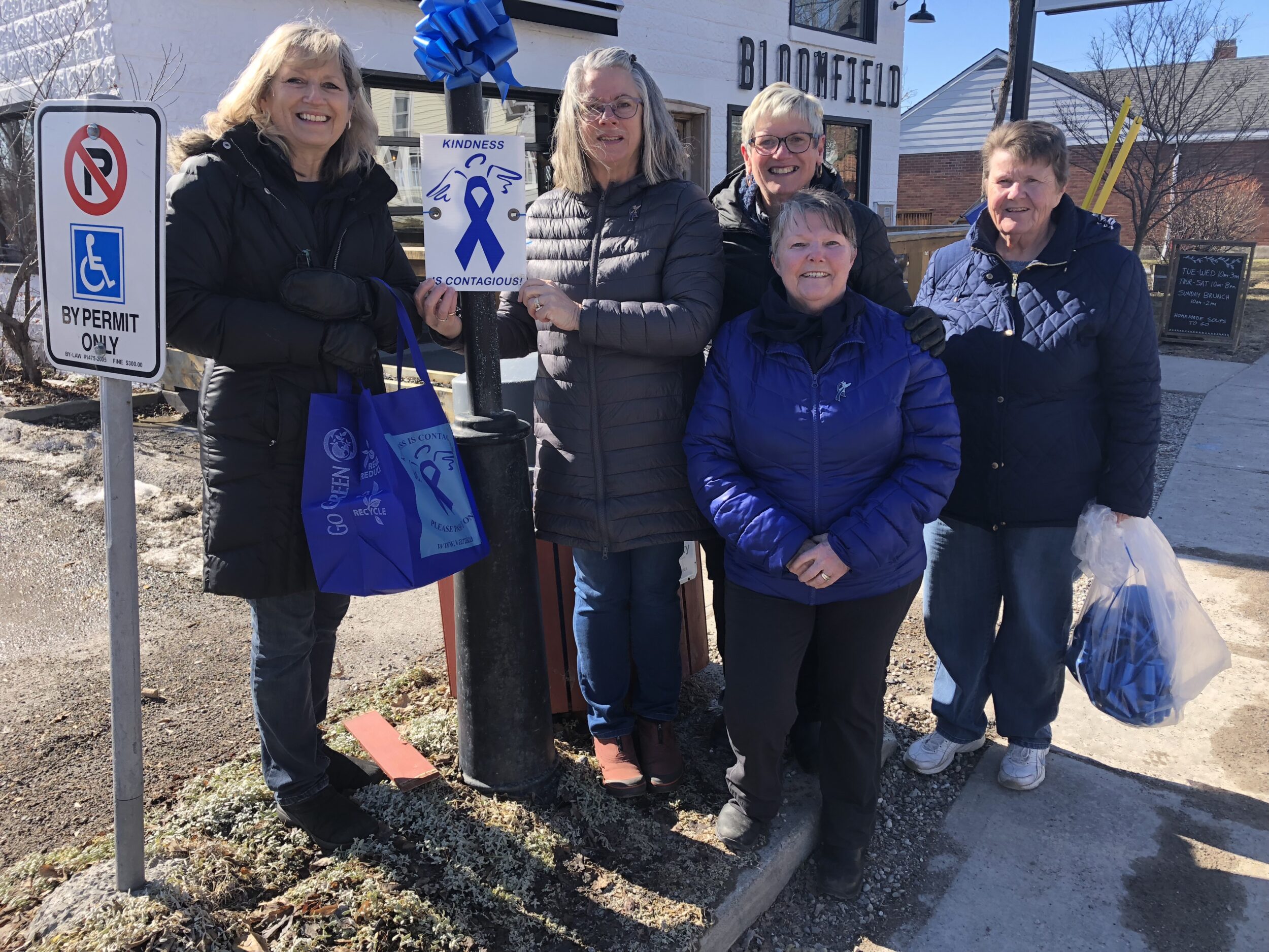 <p>BE KIND (From left) Janice Macleod, Chris Macdonald, Pam Smith, Margie Robb and Sue Maybee were in Bloomfield Thursday preparing the village for the 24th annual Violence Awareness and Random Acts of Kindness week. (Jason Parks/Gazette Staff)</p>
