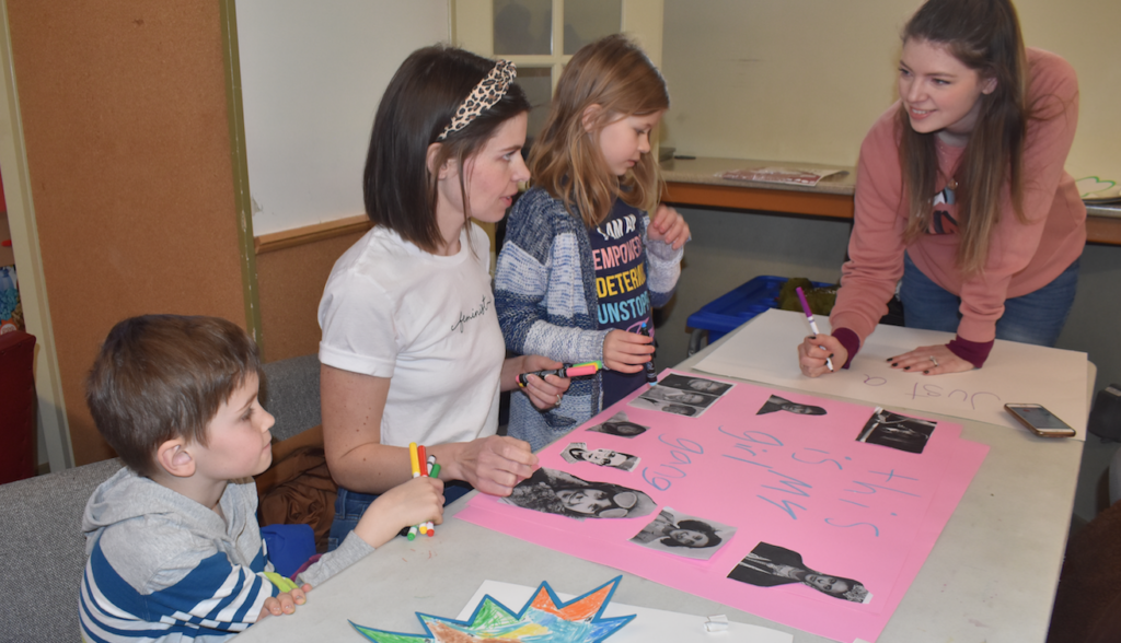 <p>ALL TOGETHER- (From left) Felix, Alicia and Sophie Myderwyk and Rebecca Holloway create posters at the International Women’s Day celebrations held at the Picton Library Sunday afternoon. (Jason Parks/Gazette Staff)</p>

