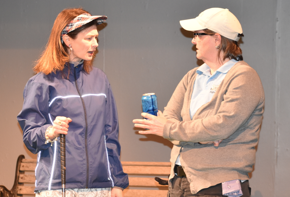 <p>THAT’S GOLF – (L-R) Kim Kennedy plays Tate, pictured here in conversation with her golfing friend, Margot, played by Susie Mitchell. (Sarah Williams/Gazette Staff)</p>

