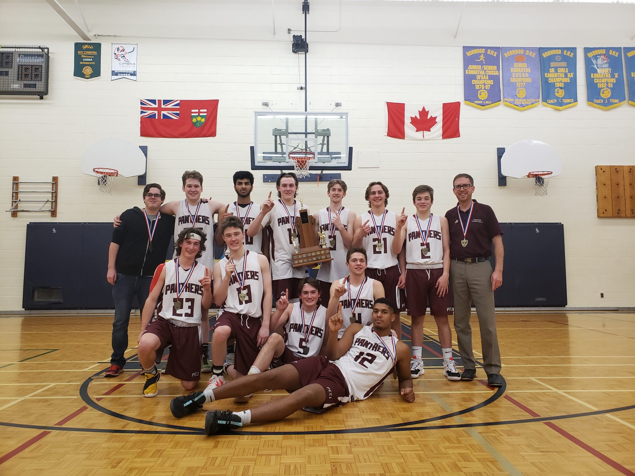 <p>The PECI Panthers celebrate their 2020 COSAA Championships in Norwood Friday. PECI downed the Nicholson Crusaders 44-33. (Submitted Photo)</p>
