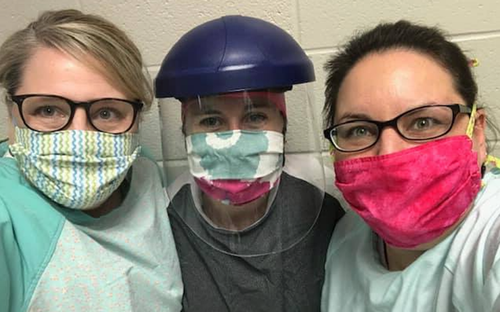 <p>PPE FOR THREE Workers at the Prince Edward Family Health Team organized COVID-19 pre-assesment centre in Picton with some of the masks produced by the volunteer group PPE for PEC. Nearly 60 local people are making alternative PPE for local frontline healthcare workers. (Submitted Photo)</p>
