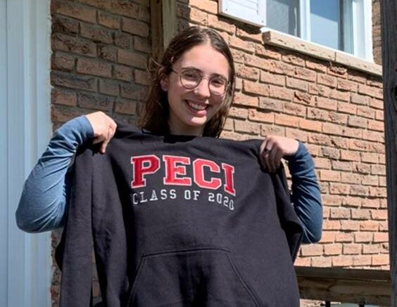 <p>SCHOOL SPIRIT- Anne-Sophie Vaillant, the final student to participate in the Rotary Youth Exchange Program through the Rotary Club of Picton, beams as she holds up a PECI grad sweatshirt gifted to her by the local secondary school. (Submitted Photo)</p>
