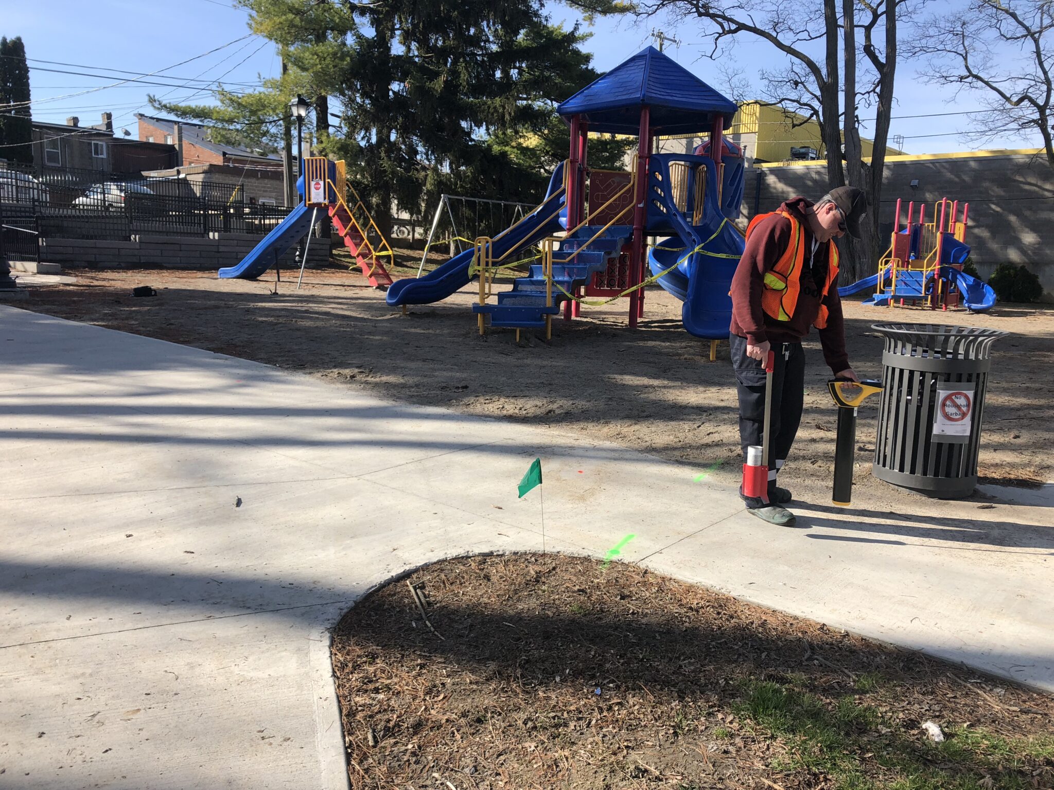 <p>A NEW NORMAL- County of Prince Edward worker Jason Young makes preparations for a more permanent physical barrier to the Benson Park Playground equipment in early April. The municipality announced Thursday its reopening some parks and public recreation areas. (Jason Parks/Gazette Staff)</p>
