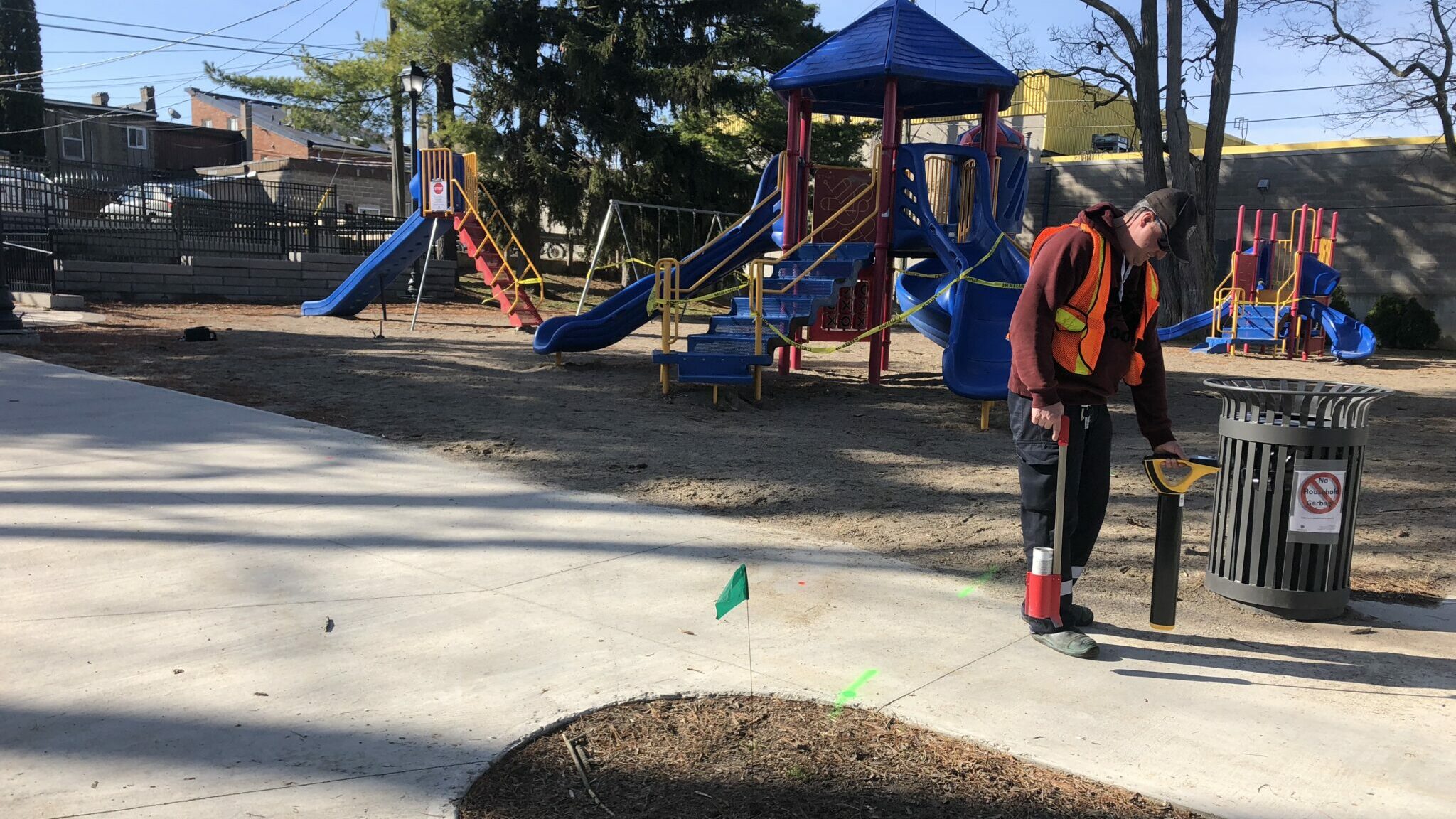 <p>A NEW NORMAL- County of Prince Edward worker Jason Young makes preparations for a more permanent physical barrier to the Benson Park Playground equipment in early April. The municipality announced Thursday its reopening some parks and public recreation areas. (Jason Parks/Gazette Staff)</p>
