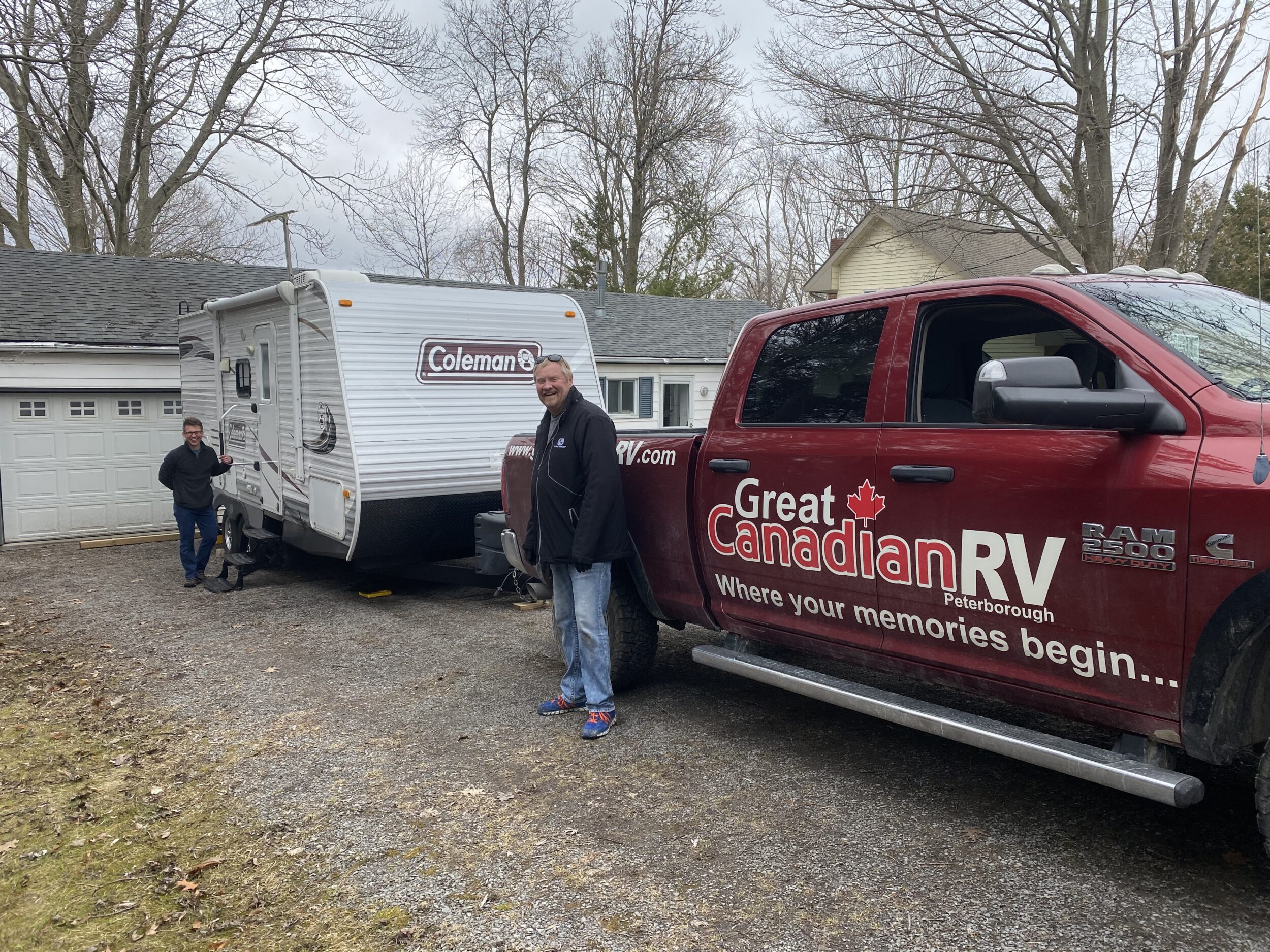 <p>HOME AWAY FROM HOME (Right) While practicing safe social distancing, Al Robinson of Great Canadian RV in Peterborough delivering an RV to (left) Ryan Hall of Picton. (Submitted photo).</p>
