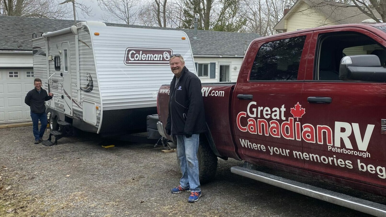 <p>HOME AWAY FROM HOME (Right) While practicing safe social distancing, Al Robinson of Great Canadian RV in Peterborough delivering an RV to (left) Ryan Hall of Picton. (Submitted photo).</p>
