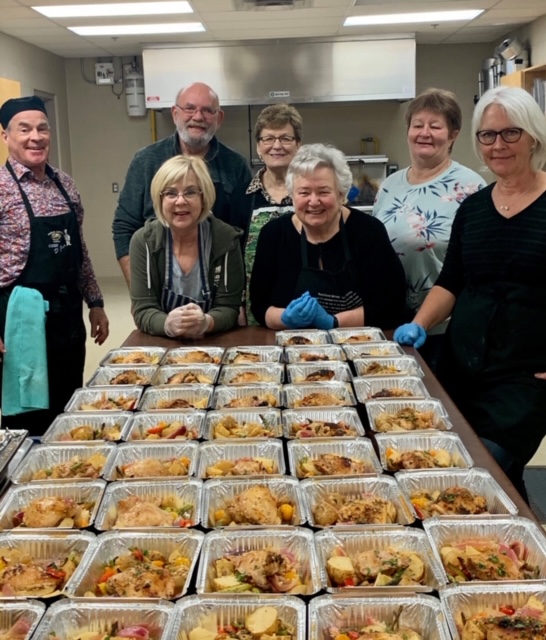<p>FOOD FOR ALL – Members of Food to Share prepare food earlier in the year for those in need (Submitted Photo).</p>
