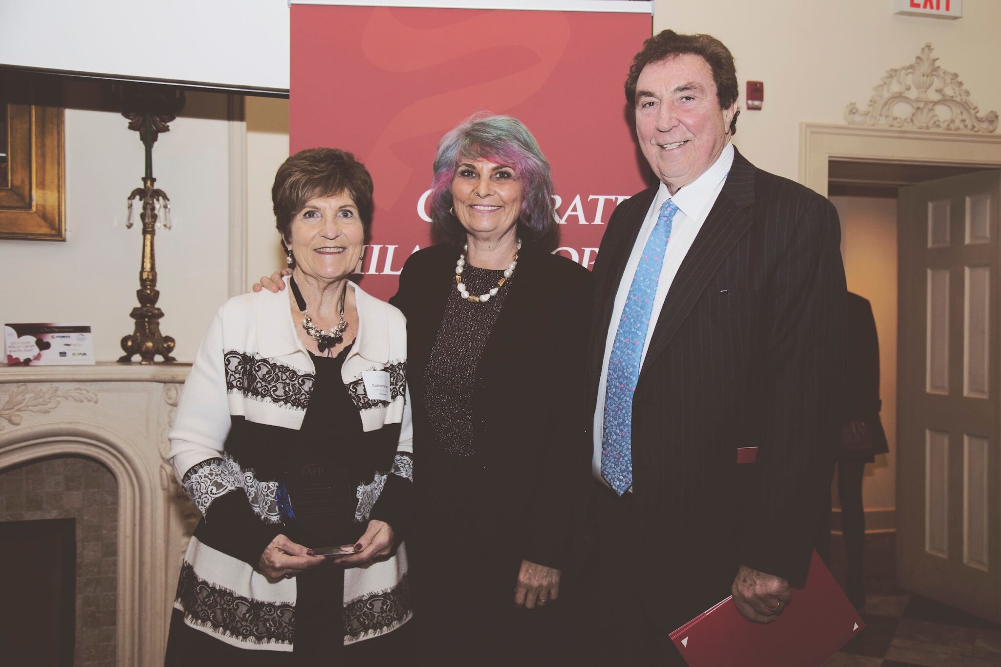 <p>COMMUNITY MINDED Catharine and Lanny Huff flank  their daughter Janine  at the Association for Fundraising Professionals 2017 philanthropy awards gala in Kingston.<br />
(Photo courtesy of Loyalist College)</p>
