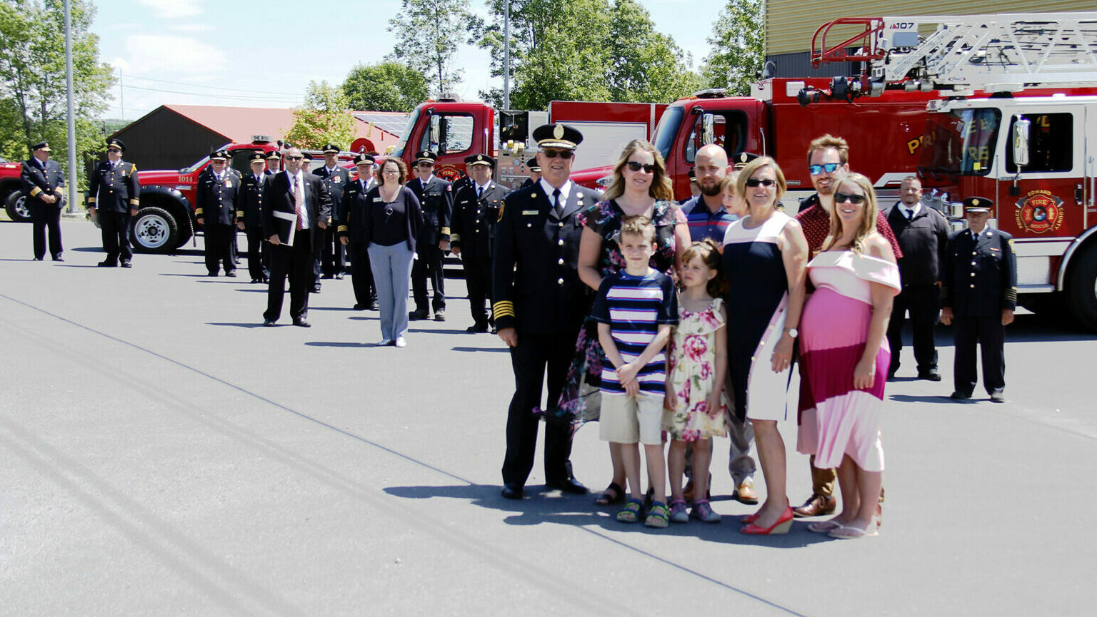 <p>HIS FINAL RIDE Former Fire Chief Scott Manlow stood with his family while his firefighter family, many different chiefs from other municipalities as far away as Ottawa, Mayor Steve Ferguson and CAO Marcia Wallace look on.  (Desirée Decoste/Gazette staff)</p>
