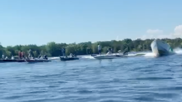 <p>A power boat veers past a number of fishing vessels at Sandy Cove on the Bay of Quinte in this screen grab of a video posted on social media. Prince Edward OPP are looking for further information in relation to this incident. (Facebook screen grab)</p>
