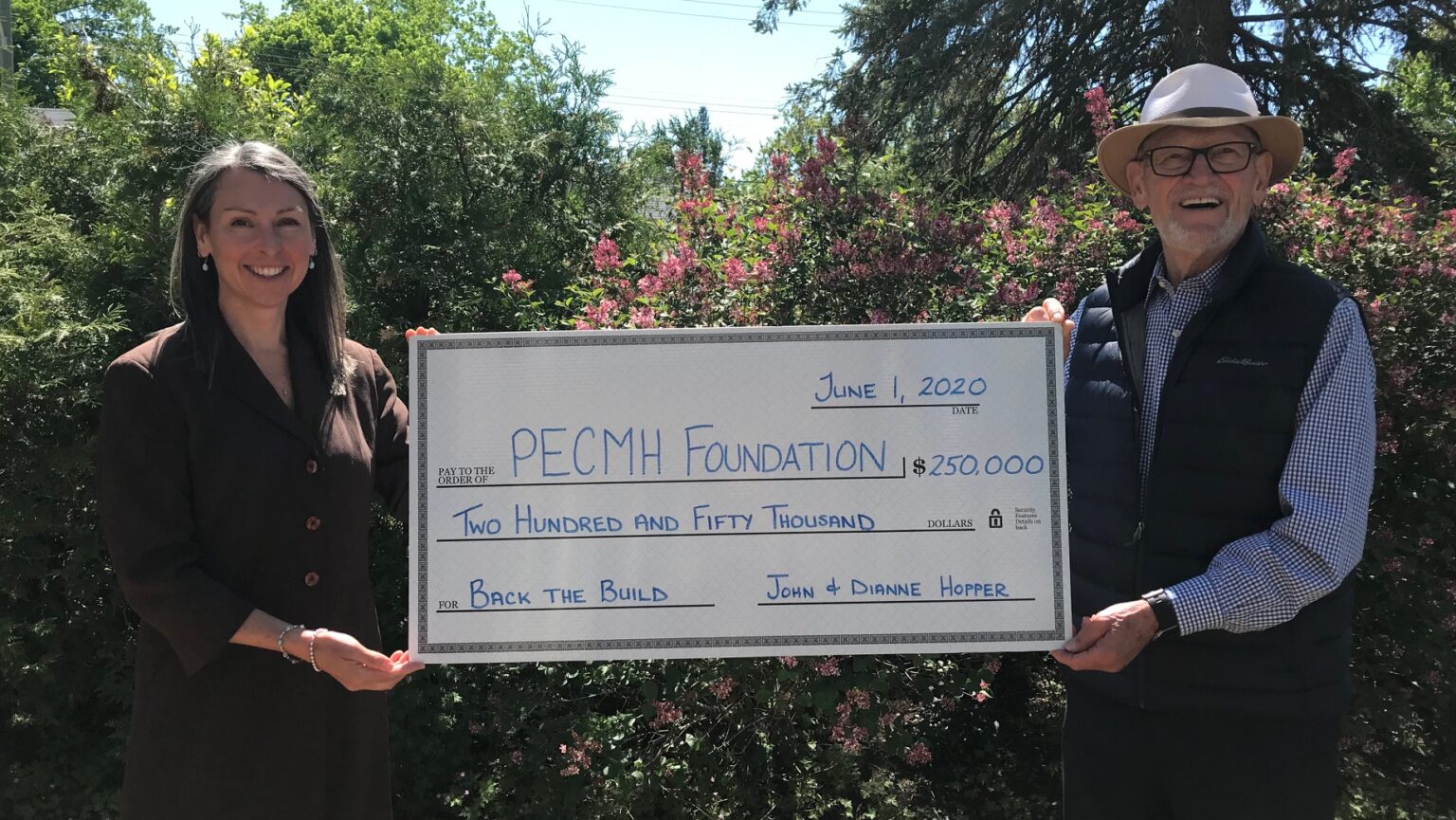 <p>Prince Edward County Memorial Hospital Foundation Executive Director Shannon Coull accepts a pledge of $250,000 from John Hopper on behalf of he and his wife Dianne (not pictured) (Submitted Photo)</p>
