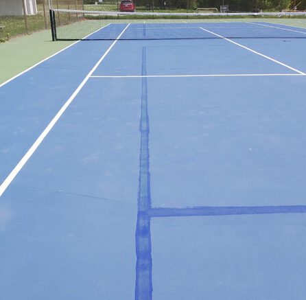 <p>The lines inside the tennis court to indicate the pickleball court have been painted over, making them difficult to see. (Submitted photo)</p>
