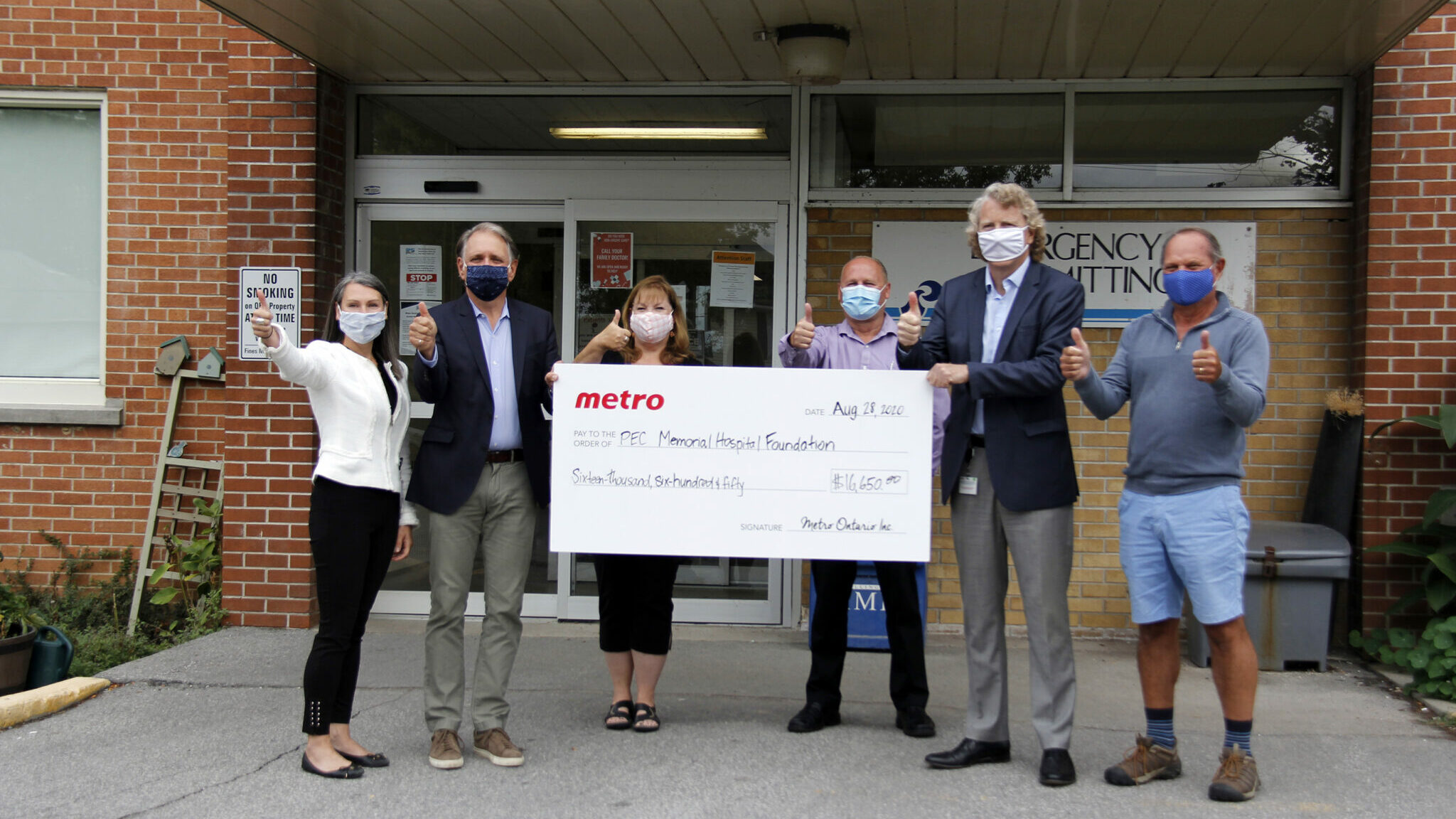 <p>WELL ROUNDED (From Left) Shannon Coull Executive Director of the PECMH Foundation, Dennis Darby Back the Build campaign co-chair, Nancy Parks Back the Build campaign co-chair, Murray Lupenette store manager of the Picton Metro, Andre Gagne vice president of Metro and Gottfried Boehringer Back the Build campaign cabinet member celebrate outside of the Emergency entrance at PECMH announcing Metro&#8217;s donation of $11,650 which was raised from the Cash Register Round up campaign at Metro. Metro head office topped the funds up to $16,650 and made a commitment to run the same campaign until 2023. (Desirée Decoste/Gazette Staff)</p>
