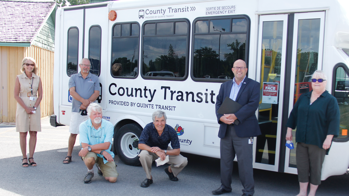 <p>ALL ABOARD! County of Prince Edward Community Services & Programs Coordinator Grace Nyman, Councillors Phil St. Jean and Bill Roberts, Brian Beiles of the County Foundation, Mayor Steve Ferguson and Quinte Access Executive Director Shelly Ackers celebrate the launch of County Transit Tuesday morning at the Crystal Palace. (Desirée Decoste/Gazette Staff)</p>
