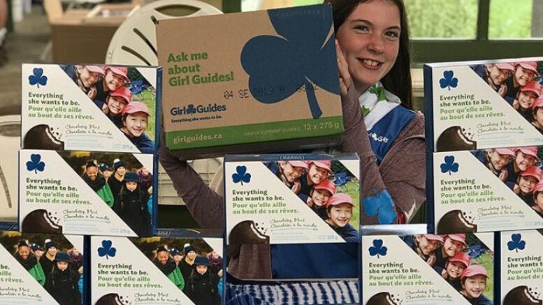 <p>GUIDING SERVICE- Ruby Warr-Hunter of the Consecon Guides at a cookie sale at the Crystal Palace in 2019. (Submitted Photo)</p>
