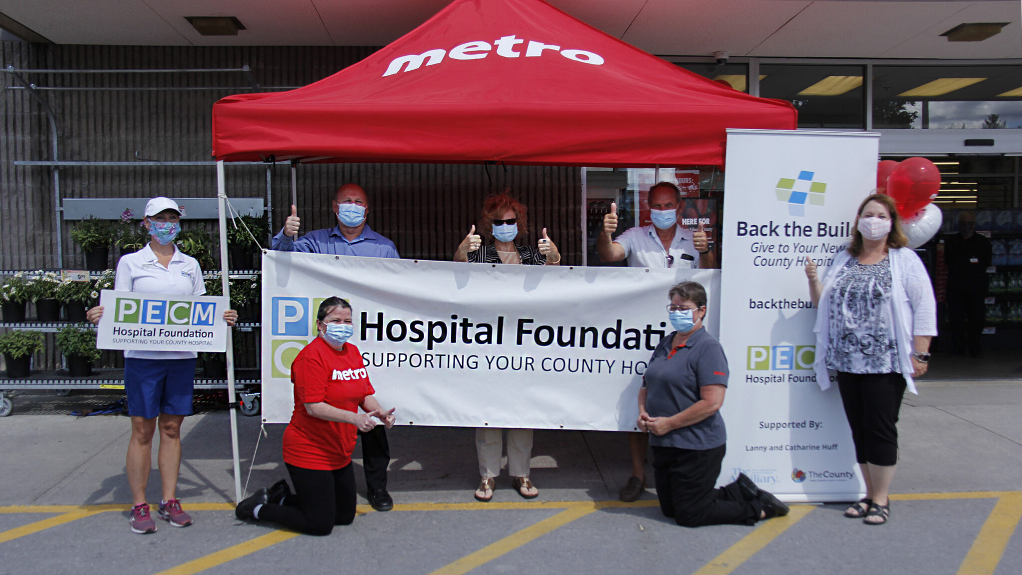 <p>REGISTER ROUNDUP From back left Murray Lupenette store manager at Picton Metro, Barbara McConnell chairperson of the PECMH Foundation and Gottfried Boehringer Back the Build campaign cabinet member<br />
From front left: Shannon Coull executive director of the PECMH Foundation, Joyce Watt an employee at Metro, Carmen Kloet bookkeeper at Metro and Nancy Parks Back the Build campaign co-chair stood in front of Picton Metro on Thursday to promote the second week of a two week campaign raising money for the Back the build campaign to build Picton a new hospital. (Desirée Decoste/Gazette Staff)</p>
