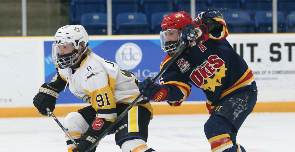 <p>Trenton Golden Hawk Evan Jamieson tries to evade Wellington Duke Ben Woodhouse during Game 3 of the 2020 Hasty P’s Summit Series in Trenton on Tuesday. (Tim Bates/OJHL Images)</p>
