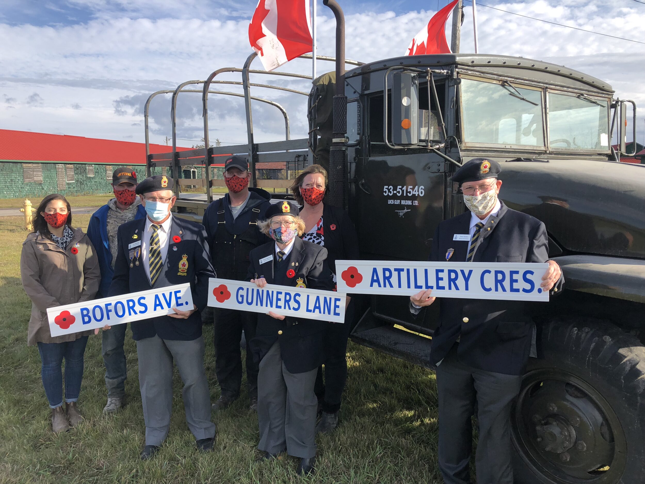 <p>SIGN OF THE TIMES- (Rear, L-R) Loch Sloy  team members Shelby Delgatto, Shawn Vickers, Steve Everall and Jacqui Burley were joined by Legion Branch 78 members (Front, L-R) Tom McCaw, Dianne Kennedy and Dave Sutton on Wednesday to announce historic roadway monikers will soon adorn the former military training base. (Jason Parks/Gazette Staff)</p>
