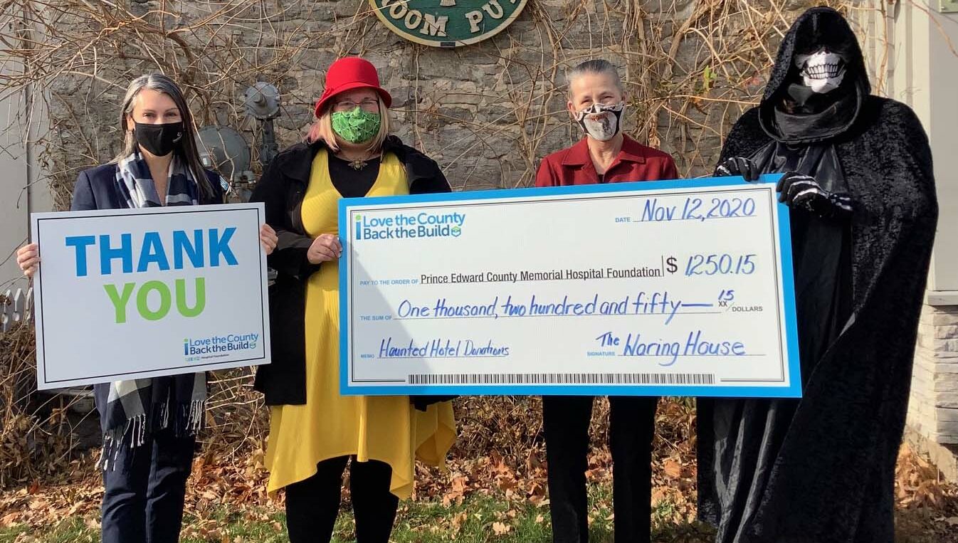 <p>HALLOWED DONATION (From left) Shannon Coull, executive director of the PECMH Foundation; Briar Boyce, senior development officer with the PECMH Foundation; Norah Rogers, innkeeper at the Waring House and Krista Tevlin, haunted hotel coordinator.<br />
(Photo by Judy Sanders)</p>
