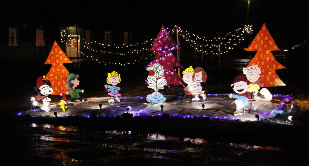 <p>NOT JUST PEANUTS Shatterbox Theatre’s depiction of a Charles Schulz scene featuring Lucy,  Linus,  Snoopy and of course Charlie Brown was one of the many popular static artwork displays at the Loch Sloy Santa Extravaganza Saturday night.  (Desirée Decoste/Gazette Staff)</p>

