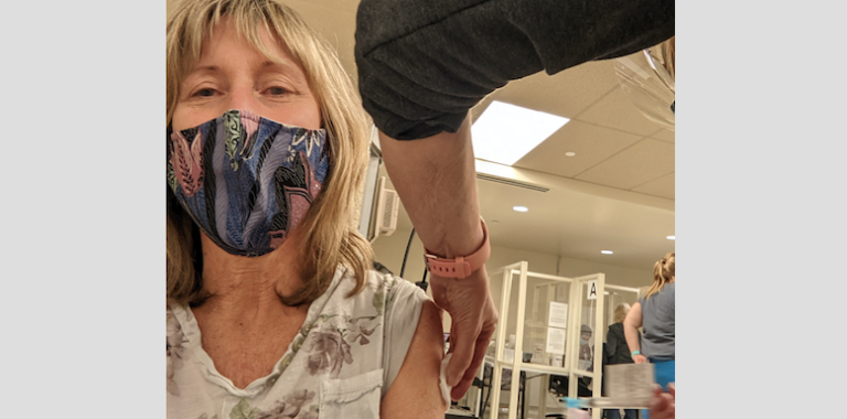 <p>GRIN AND BARE it  Dr. Anne Nancekievill of the Prince Edward Family Health Team is injected with a dose of the COVID-19 vaccine last month. (Submitted Photo)</p>
