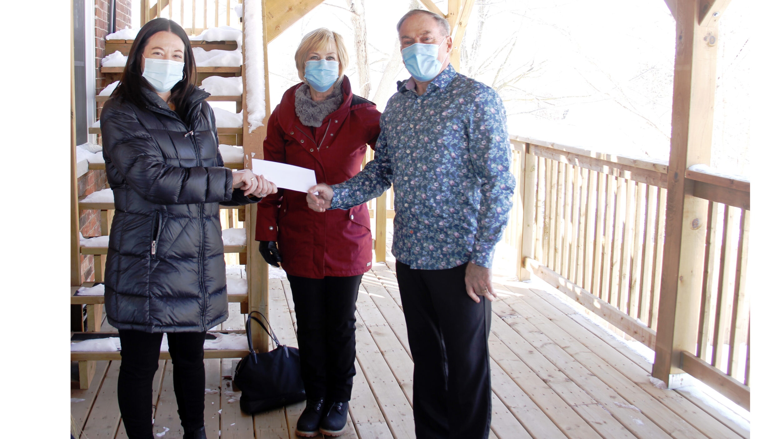 <p>WINNING THE MARKET- (From Left) Lean Morgan, Executive Director of Alternatives for Women received a donation from  Shirley and Chris Van Steen in the amount of $27,300. The funds came as profit from a recent stock sell off. (Desirée Decoste/Gazette staff)</p>
