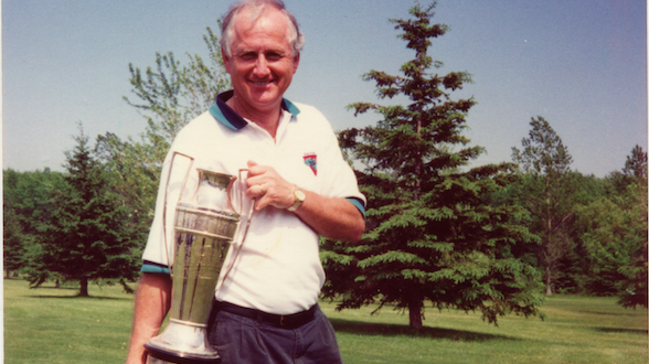 <p>Famed local sportsman Carl Stacey with the Quinte Cup. Stacey once pitched a 19 inning, complete game win and hit a home run in a 1966 softball contest with a broken left arm. (Stacey Family)</p>
