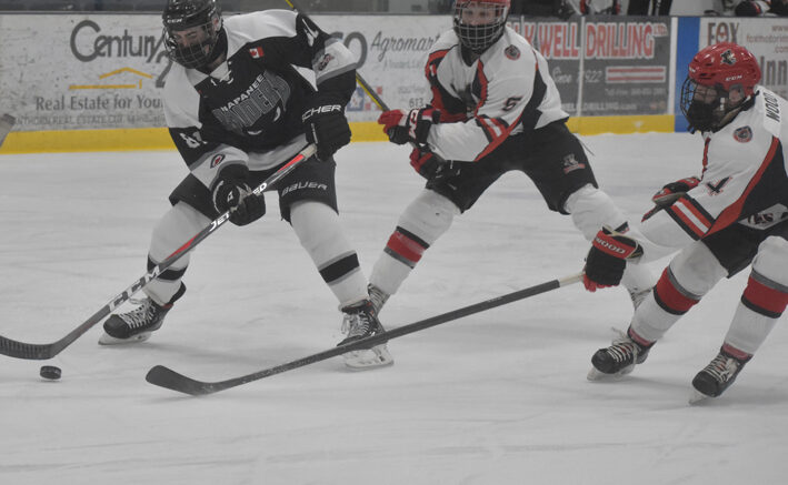 <p>END OF THE VOYAGE  Picton Pirates defenceman (5) Nick Kyte and (4) Kurtis Wood attempt to corral  Napanee Raider Beckett Palmer Stephen Friday night. Both Pirates graduated from the club in 2021.  (Jason Parks/Gazette Staff)</p>
