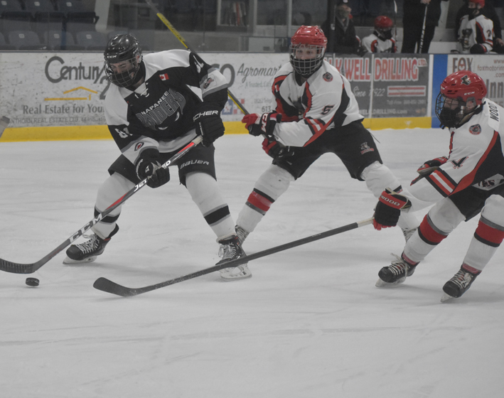 <p>END OF THE VOYAGE  Picton Pirates defenceman (5) Nick Kyte and (4) Kurtis Wood attempt to corral  Napanee Raider Beckett Palmer Stephen Friday night. Both Pirates graduated from the club in 2021.  (Jason Parks/Gazette Staff)</p>
