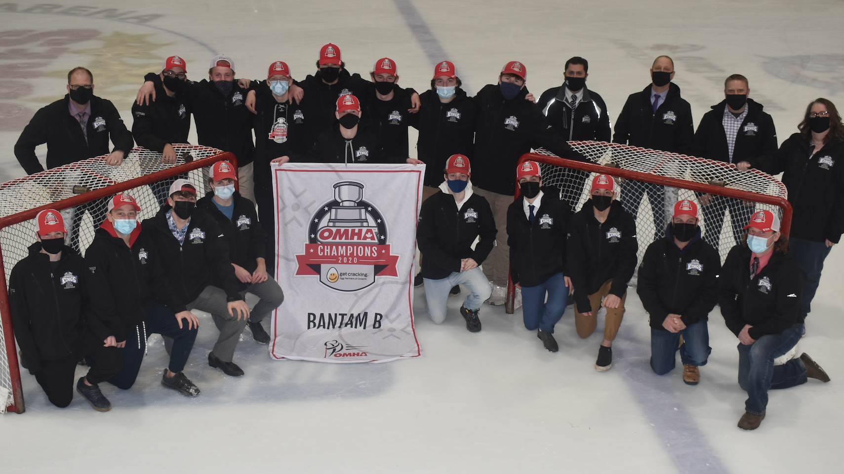<p>CHAMPS- Staff and players with the 2019-20 OMHA Champions Lehigh Bantam B PECMHA Kings gather with their All Ontario banner Saturday night. (Jason Parks/Gazette Staff)</p>
