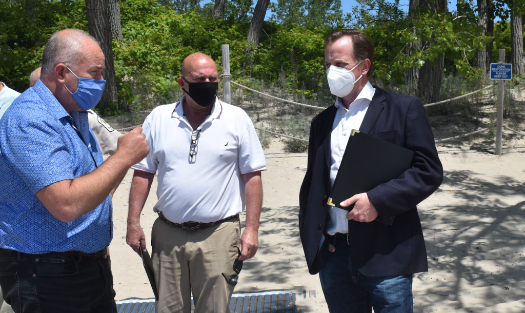 <p>Bay of Quinte MPP Todd Smith, County of Prince Edward Mayor Steve Ferguson and Minister of the Environment, Conservation and Parks Jeff Yurek at Sandbanks Provincial Park on Thursday. (Jason Parks/Gazette Staff)</p>
