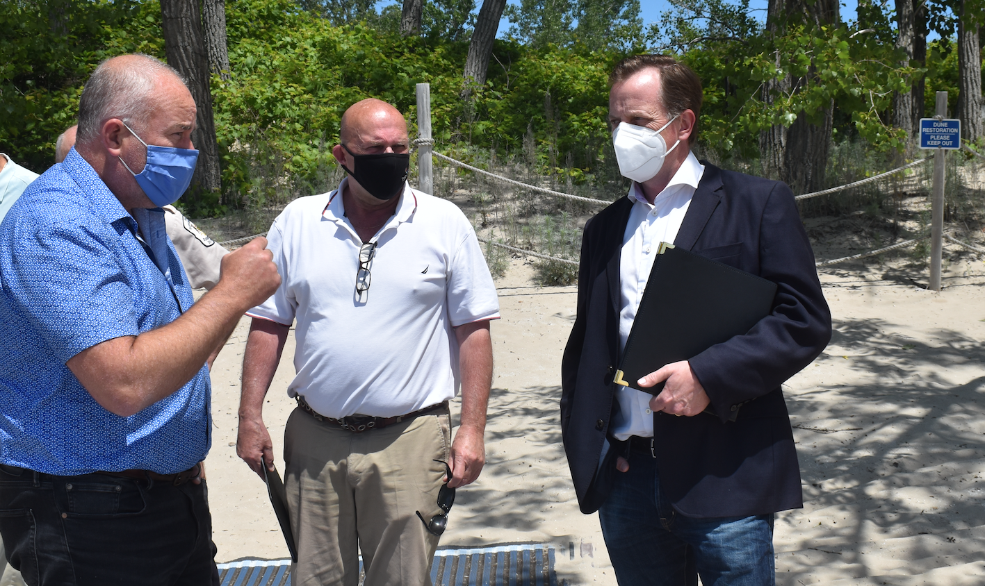 <p>Bay of Quinte MPP Todd Smith, County of Prince Edward Mayor Steve Ferguson and Minister of the Environment, Conservation and Parks Jeff Yurek at Sandbanks Provincial Park on Thursday. (Jason Parks/Gazette Staff)</p>
