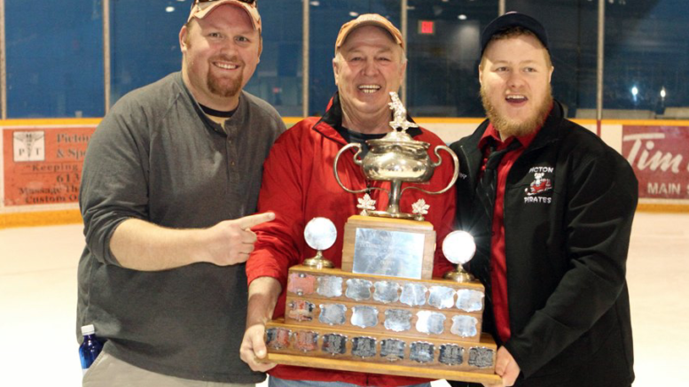 <p>THE PAST,PRESENT & FUTURE-  (From left) Jason Parks and Ron Norton celebrate the 2013 Schmalz Cup championship with then-Picton Pirates Coach and GM Ryan Woodward. Parks is returning to the club as GM and Norton has taken over as President during a change of the volunteer executive board. (Dean Peever for the Gazette)</p>
