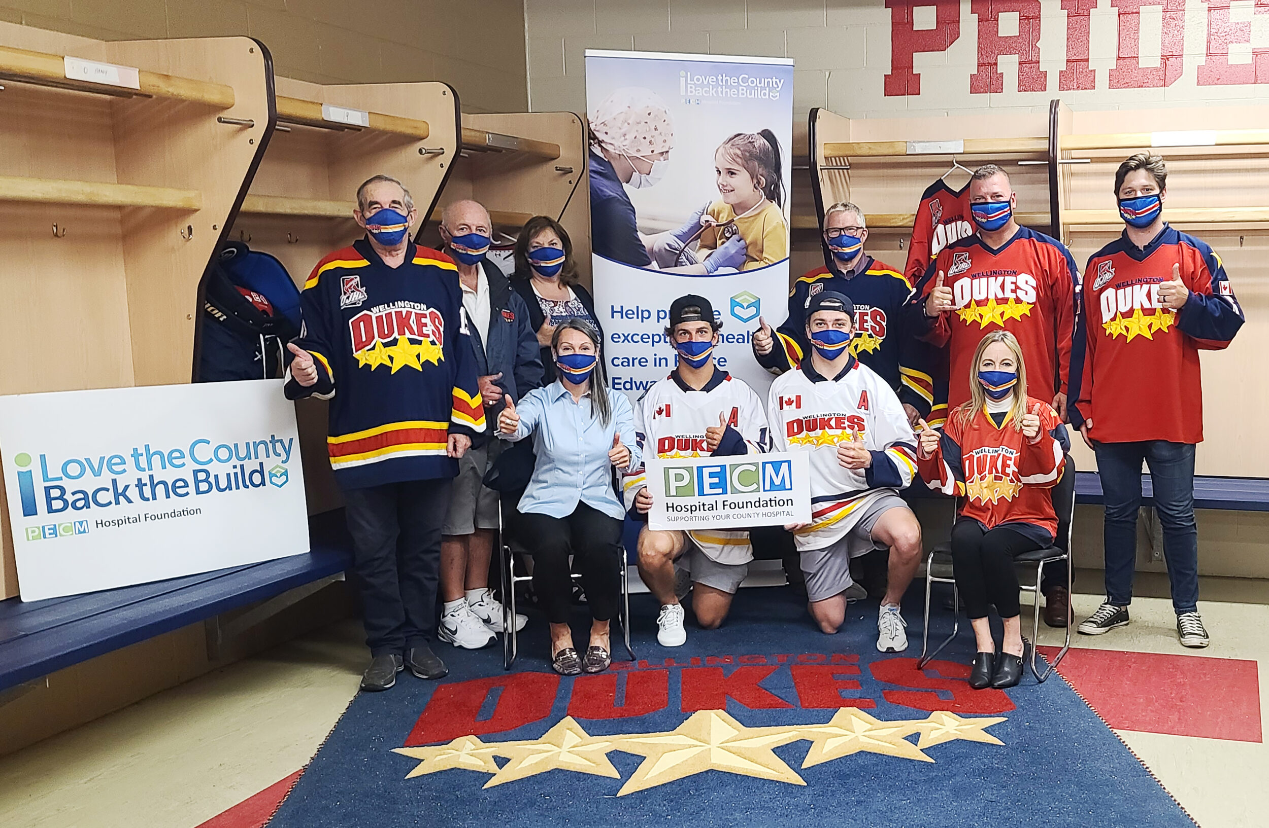 <p>The Wellington Dukes will be donating a portion of each season ticket package sold for 2021-22 to the Back the Build Campaign for a new Prince Edward County Hospital. Pictured at the recent announcement are Don Cotton – Dukes Assistant GM; Jim Dunlop, Back the Build Campaign Cabinet Member; Nancy Parks, Back the Build Campaign Cabinet Co-Chairperson; Rob Ridgley – Dukes General Manager; Don Boucher – Dukes Sales Manager; Derek Smith – Dukes Head Coach, (Front, L-R) Shannon Coull, Executive Director of the PECMH Foundation; Jacob Vreugdenhill Dukes 21-22 Player; Cole McGuire Dukes 21-22 Player and Kelly Martin – Dukes Director of Marketing. (Photo by Briar Boyce)</p>
