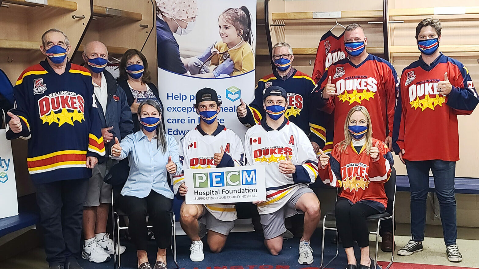 <p>The Wellington Dukes will be donating a portion of each season ticket package sold for 2021-22 to the Back the Build Campaign for a new Prince Edward County Hospital. Pictured at the recent announcement are Don Cotton – Dukes Assistant GM; Jim Dunlop, Back the Build Campaign Cabinet Member; Nancy Parks, Back the Build Campaign Cabinet Co-Chairperson; Rob Ridgley – Dukes General Manager; Don Boucher – Dukes Sales Manager; Derek Smith – Dukes Head Coach, (Front, L-R) Shannon Coull, Executive Director of the PECMH Foundation; Jacob Vreugdenhill Dukes 21-22 Player; Cole McGuire Dukes 21-22 Player and Kelly Martin – Dukes Director of Marketing. (Photo by Briar Boyce)</p>
