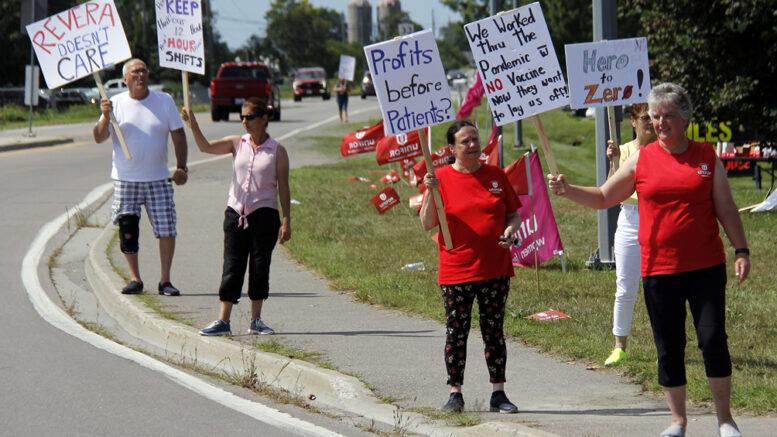 <p>FRONT LINE FIRE Unifor Local 8300 information picketers outside Hallowell House on Monday attract the attention of passersby to proposed staffing reductions that will eliminate PSW and RPN positions.  (Desirée Decoste/Gazette Staff)</p>
