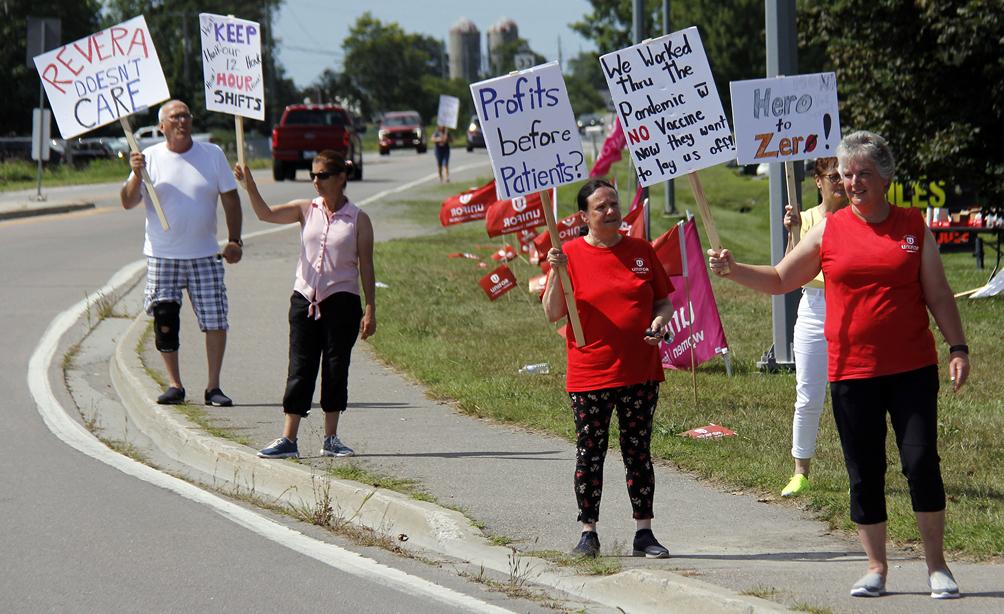 <p>FRONT LINE FIRE Unifor Local 8300 information picketers outside Hallowell House on Monday attract the attention of passersby to proposed staffing reductions that will eliminate PSW and RPN positions.  (Desirée Decoste/Gazette Staff)</p>
