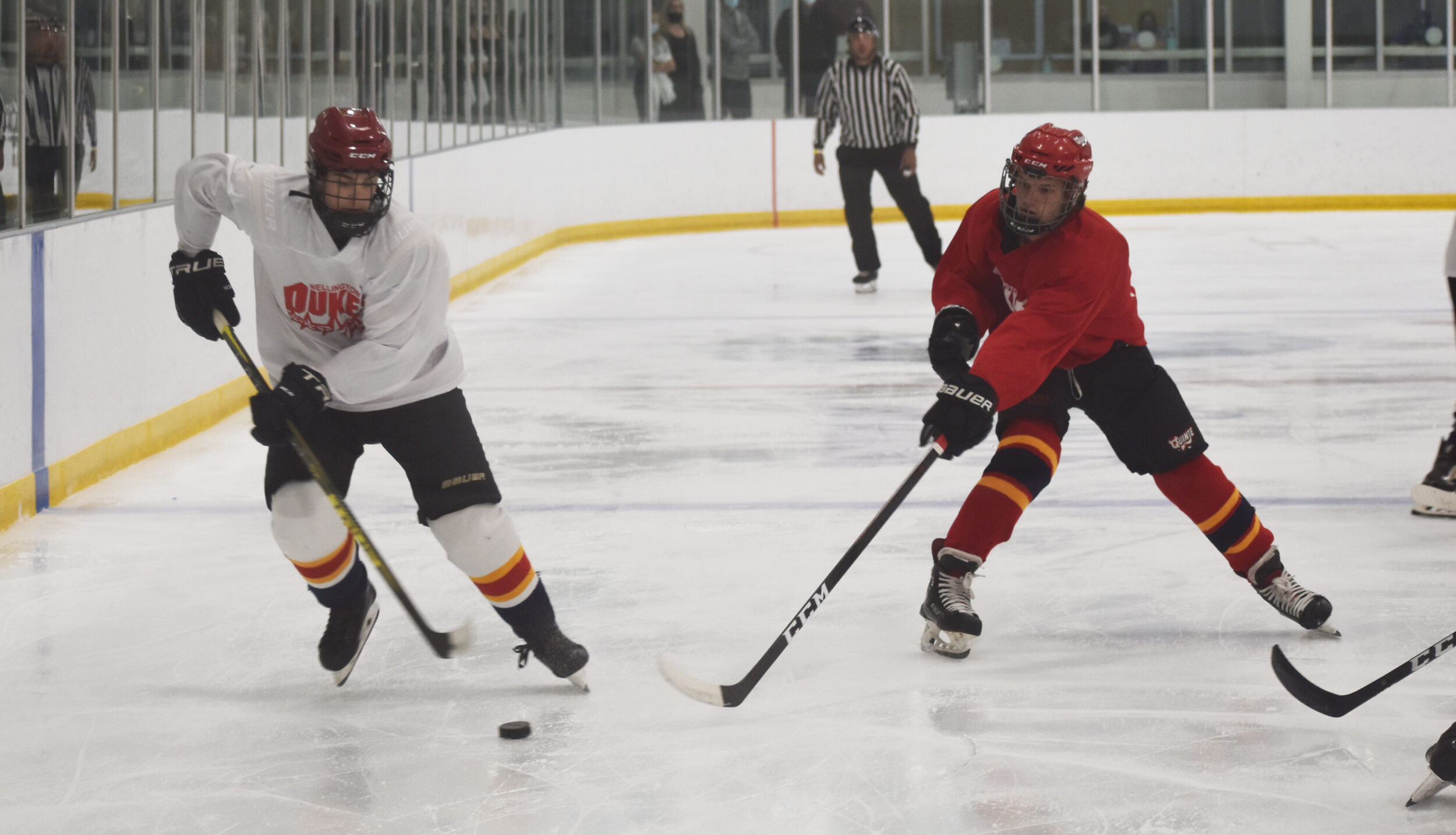 <p>Prince Edward County Kings forward Ben Smith tries to escape Quinte Red Devil Justin Murdoch during the Wellington Dukes Identification camp this weekend in Belleville. (Jason Parks/Gazette Staff)</p>
