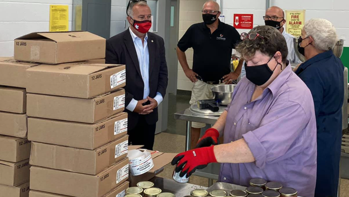 <p>AT THE HUB OF IT ALL County Fare members show off their labeling process for (From Left) Neil Ellis, Phil St. Jean and Steve Ferguson  at the County Food Hub Friday.  (Submitted Photo)</p>
